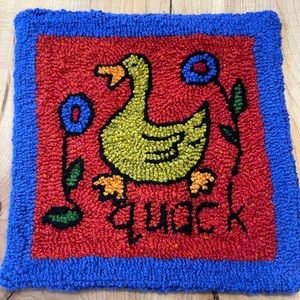 “Cluck” hooked wall hanging